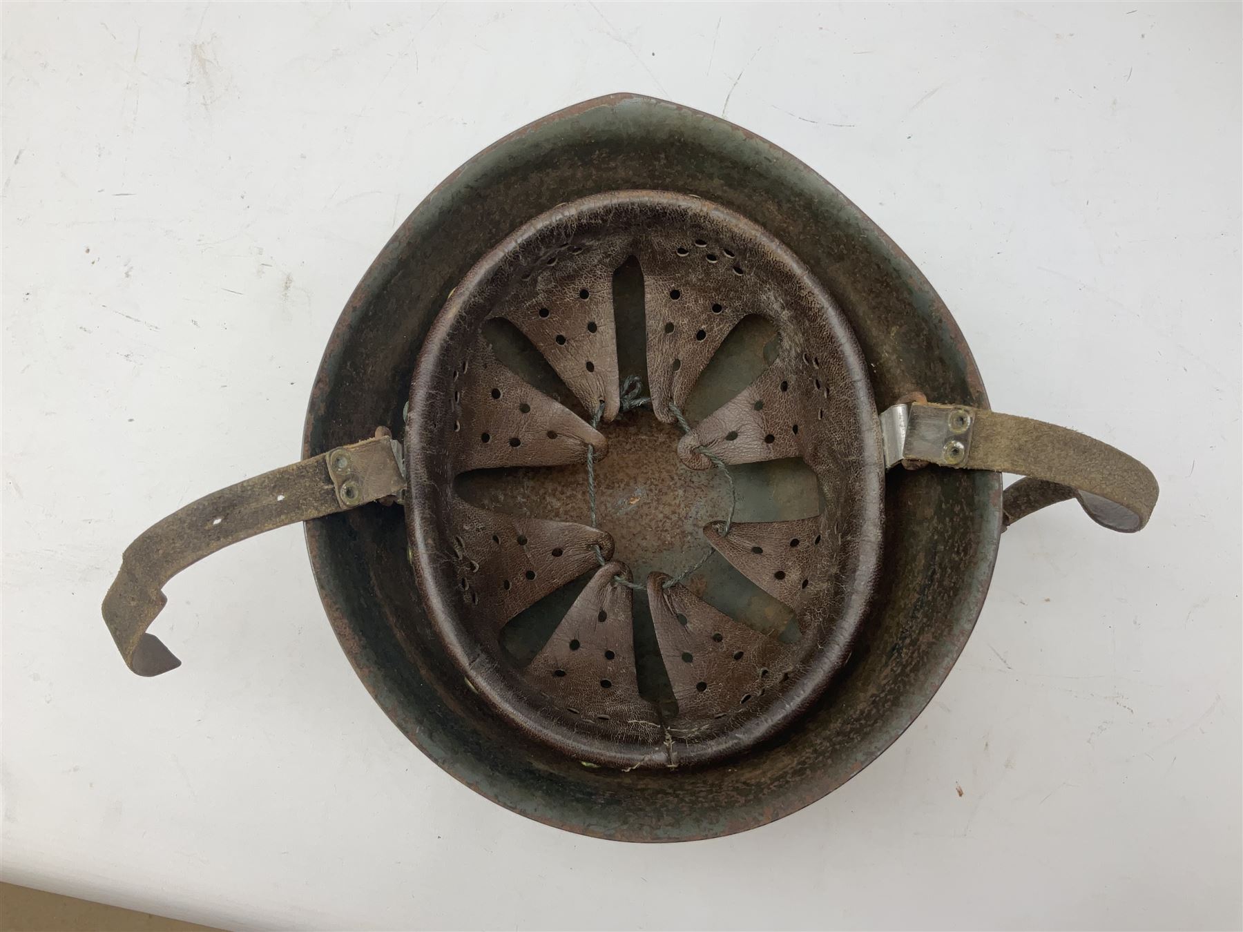 WWII Italian steel helmet with liner and chin strap