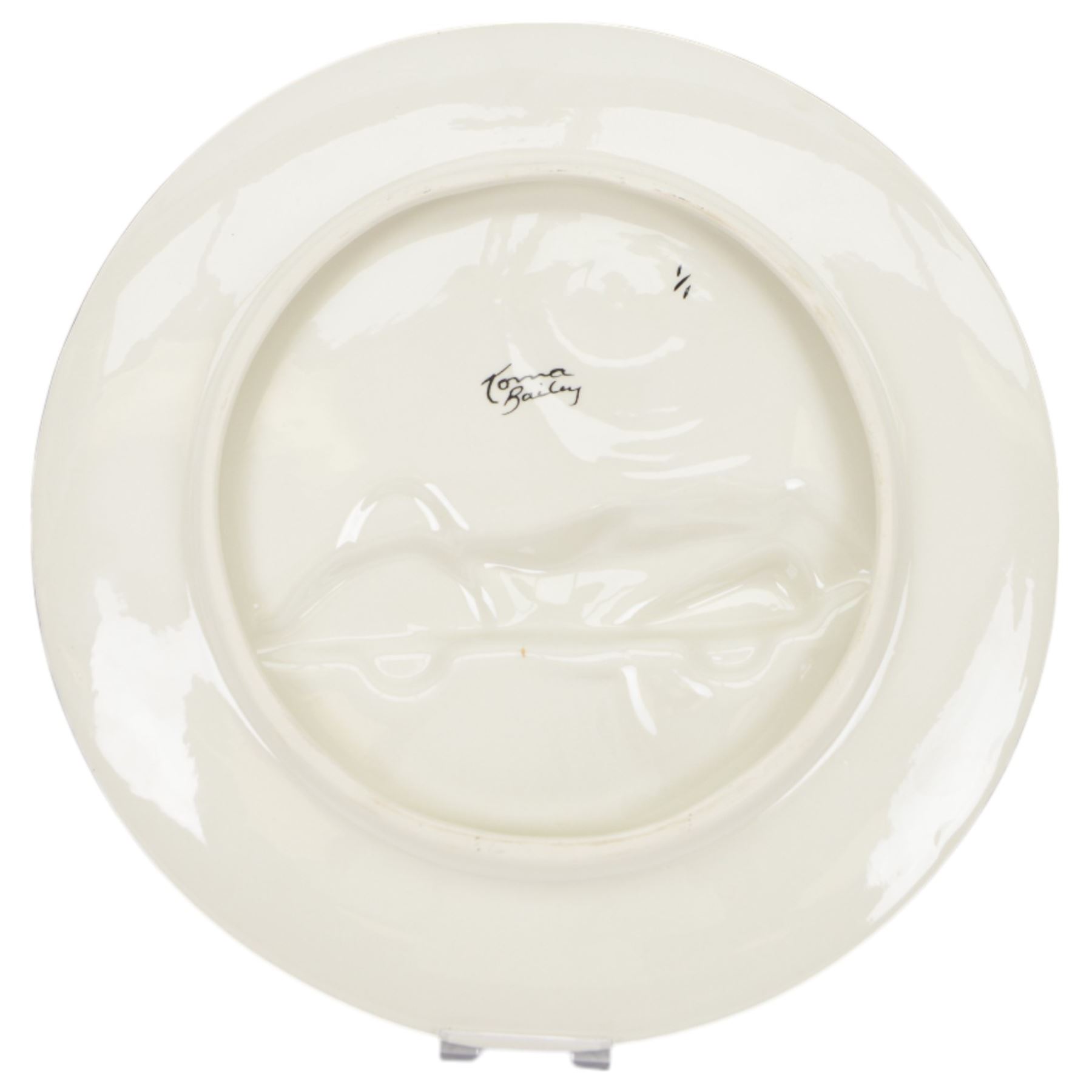 Lorna Bailey charger, limited edition no. 1/1, decorated with a race car in relief within bright stylised landscape, signed verso, D34.5cm