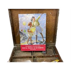 Dorothea Sharp ROI RBA (1874-1955): 20th century mahogany artist's box from Sharp's London studio, including contents: brushes and pallet knives, together with a studio palette, The Biography of Dorothea Sharp, Rock Pools & Sunshine by Helen Entwisle, and copies of two letters relating to the acquisition of the artist's box.

Provenance: Acquired alongside the purchase of other items from Sharp's Studio from Mr & Mrs Mills by Biographer Helen Entwisle in 1994). Later purchased by the current vendor along with other items from Entwisle who currently lives in Knaresborough. (Part sold at Lanes in Cornwall). 
