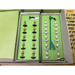 Subbuteo - three boxed sets comprising Football Express with two five-a-side teams and floodlighting; Continental with four teams and accessories; and International Edition Table Rugby with two teams; together with a Real Madrid 1974-75 League Champions pennant (4)
