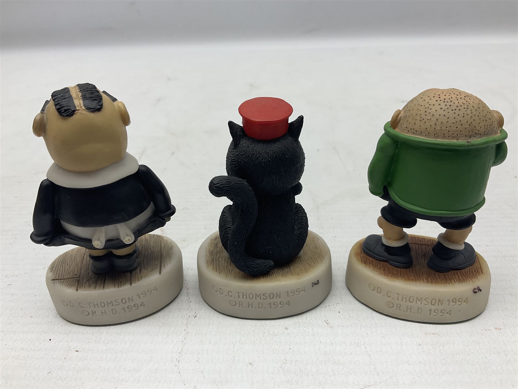 Thirteen Robert Harrop figures from the Beano Dandy collection, comprising Yo-Yo Collectors Piece 1996, Desperate Dan BD03, Cuthbert Cringeworthy BD08, Teach BD06, 'Erbert BD14, Toots BD12, Winston BD17, Fatty BD07, Dennis The Menace BD01, Dennis the Menace Fishing BD806, Sydney BD13, Wilfrid BD15 and Plug BD11