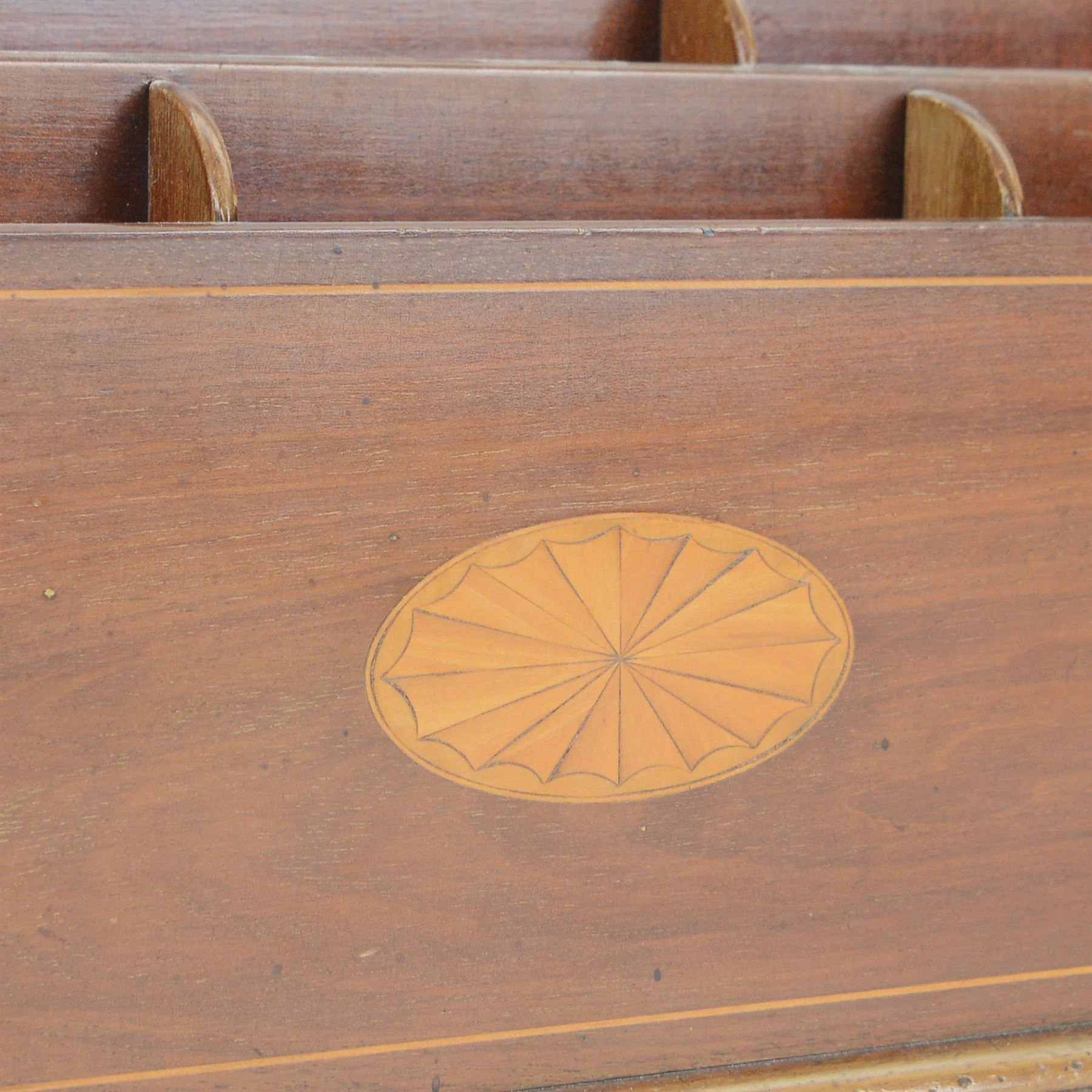 Edwardian mahogany letter rack, of rectangular form with curved sides and divided interior, the front inlaid with central oval fan motif and conforming corners, H20.5cm W33cm D14cm