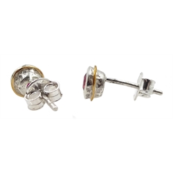 Pair of silver and 14ct gold wire ruby stud earrings, stamped 925