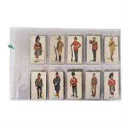 Collection of military cigarette cards, including Churchmans cigarette cards and Ogden's G...