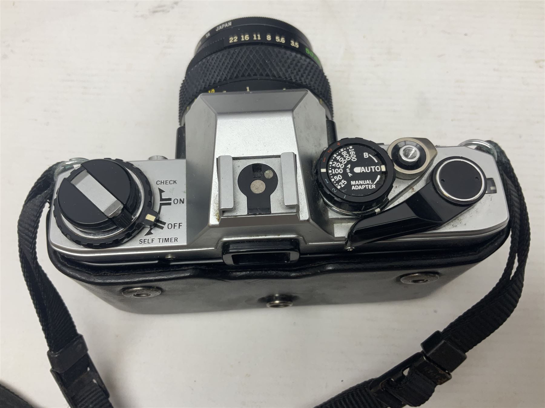 Olympus OM-2 camera body, serial no 1117526, with Olympus OM-System Zuiko Auto-W 28mm 1:2.8'  lens serial no 336591, Olympus OM10 camera body serial no 2392257, with Olympus OM-System Zuiko Auto-Macro 50mm 1:3.5' lens serial no 225784, Soligor C/D mirror lens 1:8 f=500mm' serial no 784035650 together with other camera equipment 