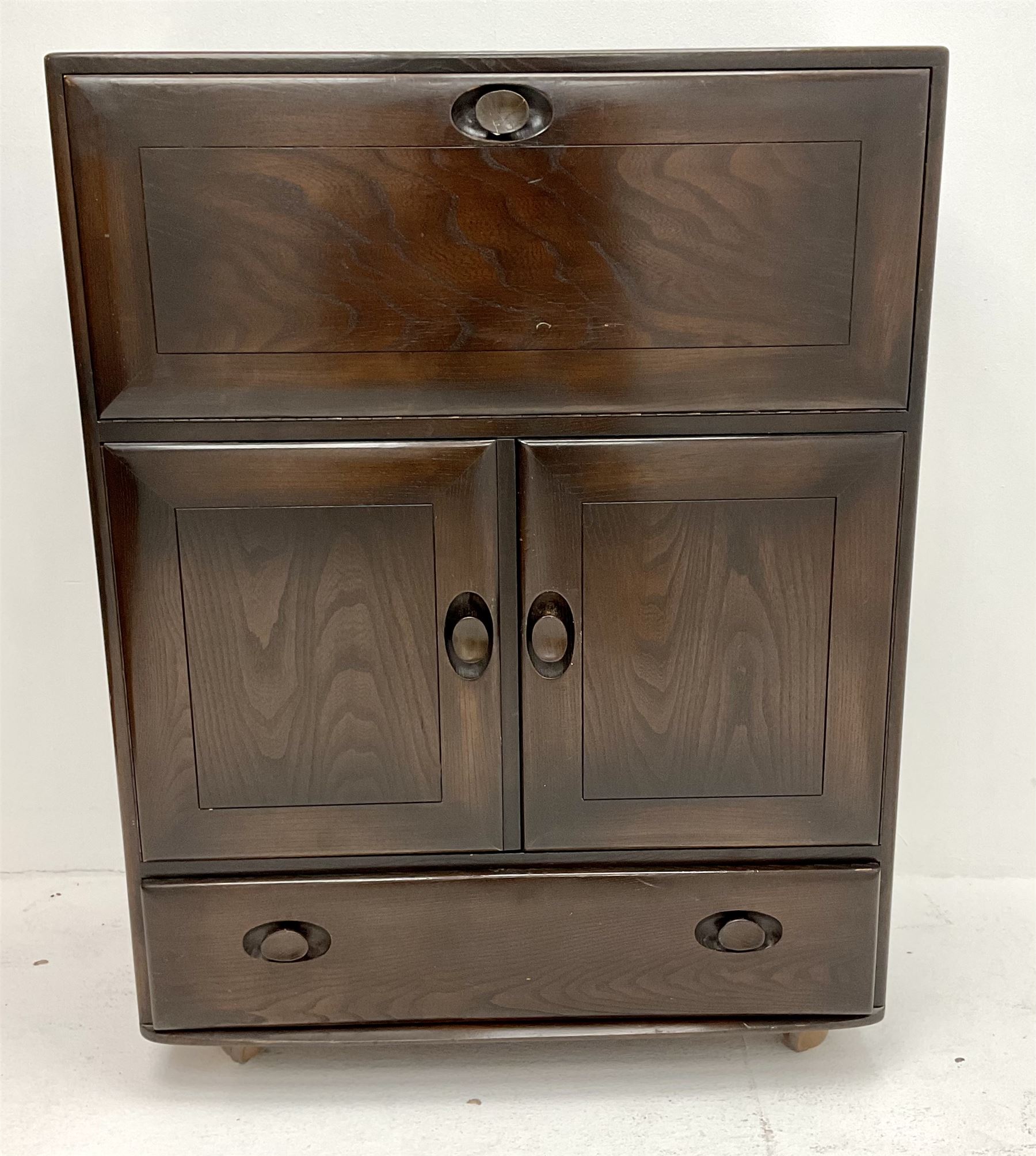 Ercol dark elm drinks single fall front unit above two