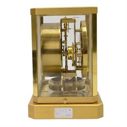 Jaeger-LeCoultre Atmos Clock - Caliber 528-6, 
gold-plated brass with glass panels, 15 jewel movement with atmospheric bellows winding motor, serial number 161881, circa 1960s, with engraved presentation plaque for W.W. Clayton, Canton Golf Club, 1964, in maker's box with instruction booklet, minute hand detached, H23.5xW21xD16cm