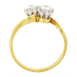Gold diamond ring, crossover set with two old cut diamonds, stamped 18ct, total diamond weight approx 1.30 carat