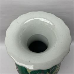 20th century Chinese Famille Rose vase, of baluster form with flared lobed rim and twin figural handles, decorated in polychrome enamel with figures dancing and playing instruments within a garden setting, H42cm