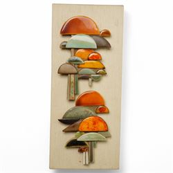 Anne Plant (British 1934-2019): 'Gerronema' 'Polygramma' and 'Icterinus', set three stoneware wall-hanging sculptures, largest 41cm x 17cm (3)