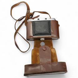 Collection of cameras to include Coronet in case, Agfa Isolette, Canon and Nikon examples etc, and a pair of cased opera glasses