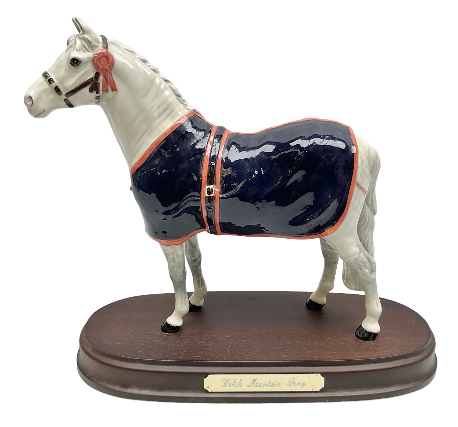 Beswick figure, grey Welsh Mountain Pony in a blue rug on plinth, no A247 H23cm