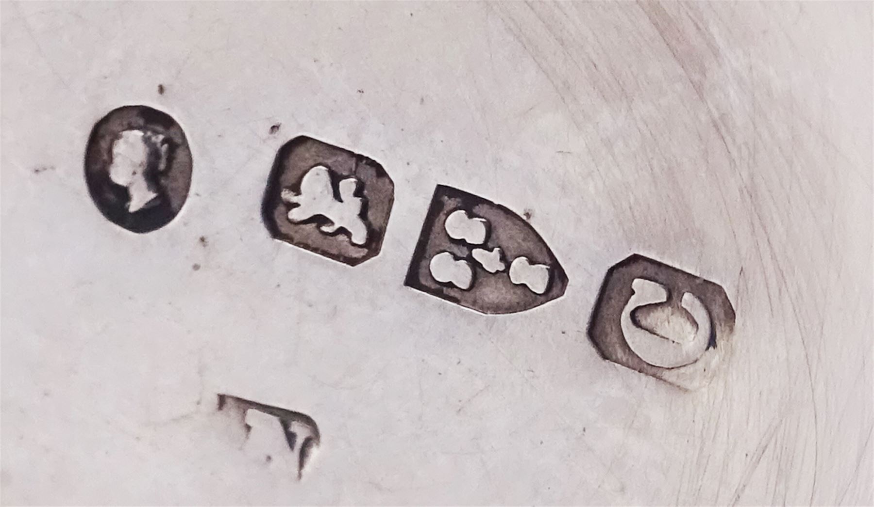 Late Victorian silver sovereign case, of plain circular form with engine turned sprung platform to interior, hallmarked Chester 1886, makers mark worn and indistinct, approximate weight 0.60 ozt (18.7 grams)