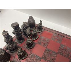 Alice in Wonderland themed chess set, with a complete set of composite figures, modelled as characters including Alice, Tweedledum and Tweedledee, the White Rabbit and the Mad Hatter, etc