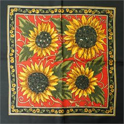 Hermès silk carré scarf, the black ground with central sunflower motif framed by ornate baroque panels and tassel borders in red, gold and yellow tones, signed Hermès Paris to the corner, hand-rolled edges, 90cm x 90cm