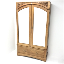 Early 20th century walnut double wardrobe, two mirrored doors enclosing hanging rail above single drawer, shaped plinth base, W113cm, H191cm, D43cm