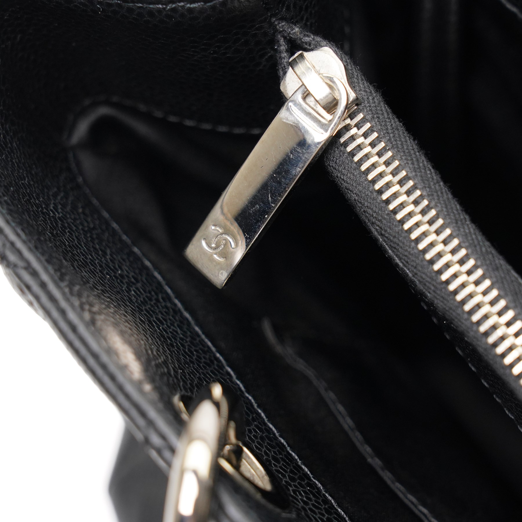 Chanel - black GST Grand Shopping Tote, caviar leather with classic diamond quilting and large embroidered CC logo to the centre front, with polished silver-tone hardware, a rear patch pocket, chain and leather handles, and an open top with three main interior compartments, 2009-2010, serial number 13547470