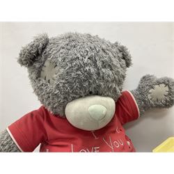 Scooter 2000 plastic battery operated remote control waiter robot with tray and remote control unit; together with a large 'Me To You' floor standing teddy bear (2)