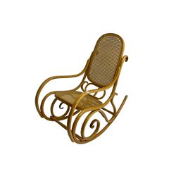 Early to mid-20th century Michael Thonet design bentwood rocking chair, with cane seat and back