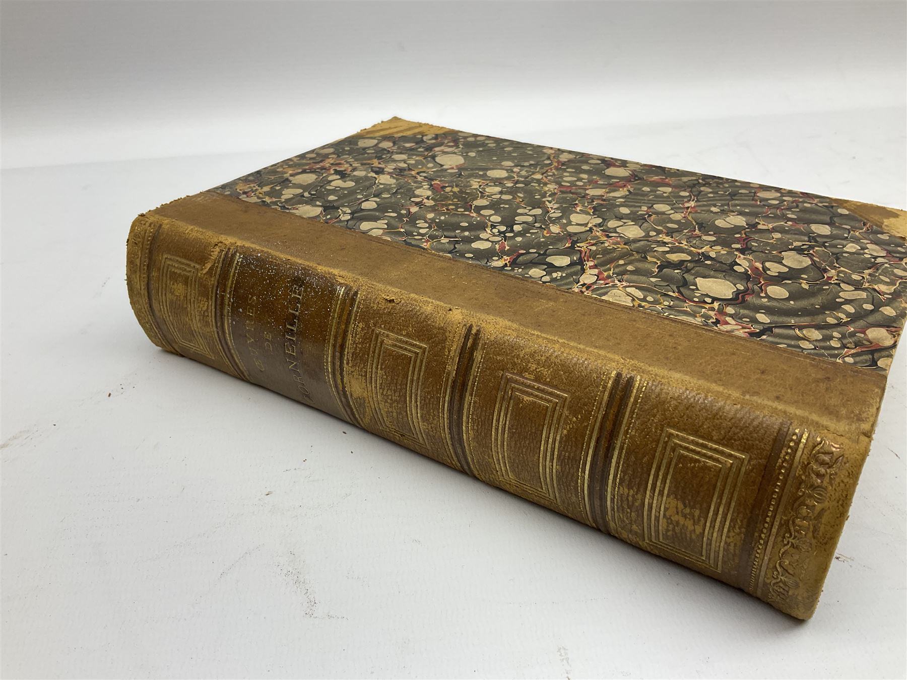 Eighteen 19th century leather bound books including Oeuvres Completes De Voltaire. 1827 Paris. Two volumes; Oeuvres De Pierre Corneille. 1892 Paris; Commentarium in Librum Geneseos Scripsit Thomas Josephus Lamy. 1883 Mechliniae; etc (18)