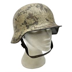 WW2 German Infantry M40 steel helmet with tropical finish and traces of single decal; with chin strap and leather liner marked 57 twice in red; back apron stamped 11 38