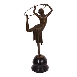 After Demetre Chiparus (1886-1947), an Art Deco style bronze modelled as a dancer with hoop, upon a stepped circular base, H51cm