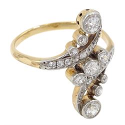 Art Nouveau gold and platinum milgrain set old cut diamond crossover twist ring, circa 1910-1920