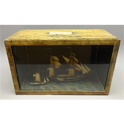  20th century naive Diorama of a twin masted whaler under full sail, with tender in glazed front case labelled 'Made by Capt. Fred Tibbetts' W39cm, H23cm, D18cm   