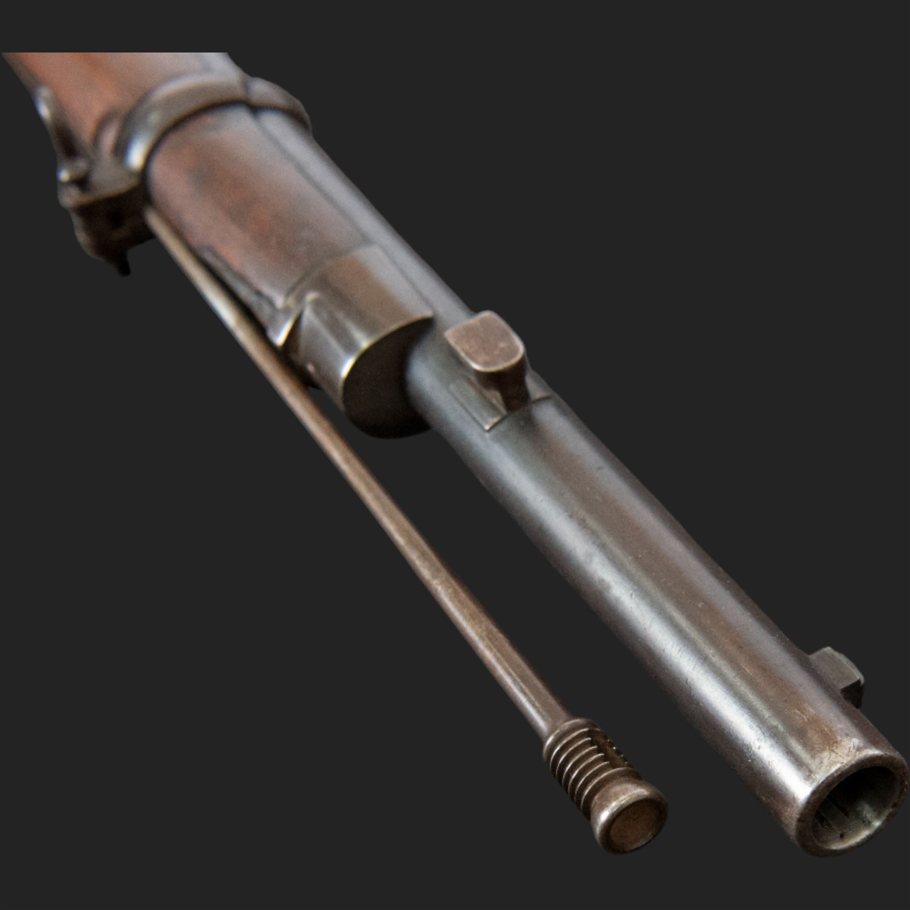 Snider-Enfield service rifle .577 calibre, barrel 33 in., tangent/ladder back sight, action marked with crowned V.R BSA & Co 1872, full stocked with two barrel bands, steel clearing rod, walnut stock marked Mx1 93 Birmingham, overall L124cm