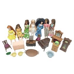 Seven Pippa dolls and a collection of plastic dolls house furniture
