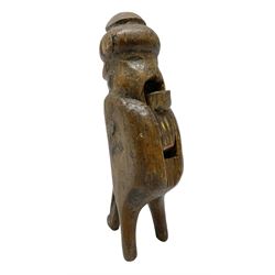 Rare primitive treen lever action nutcracker, probably late 17th/early 18th century, carved in the form of a man, with old collector label to side inscribed 'A Nutcracker XVI Century', H18cm