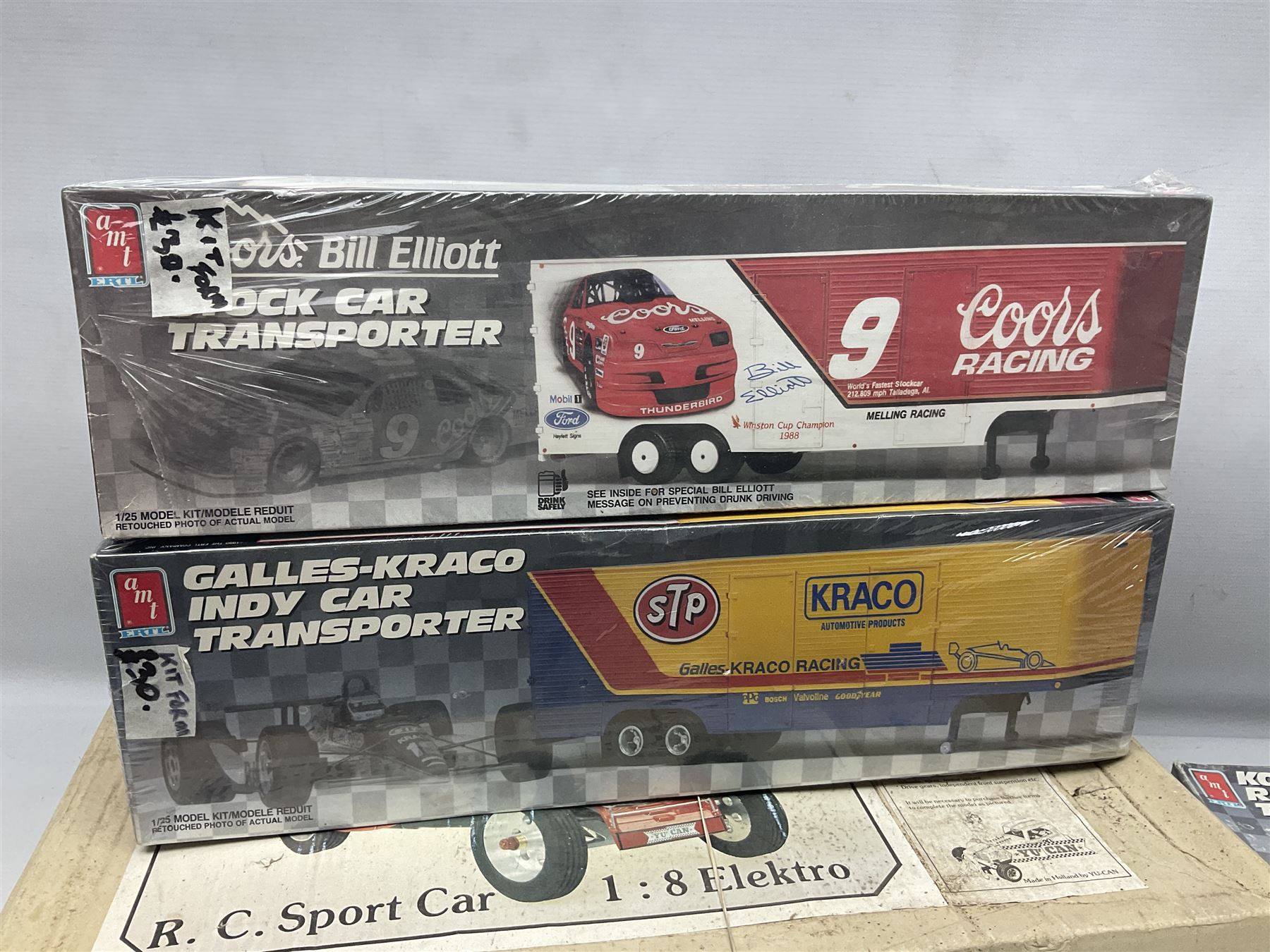AMT Stock Car Transporter, Kodak Film Racing Team Transporter and Galles-Kraco Indy Car Transporter, Bugatti model etc, all boxed