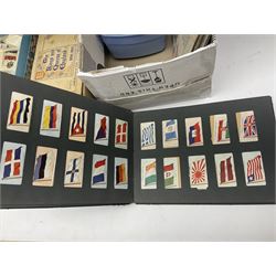 Various postcards, cigarette cards and tea cards, including Lawson Wood postcards, Brooke Bond cigarette cards etc 