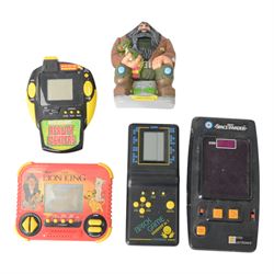 Five 1980s and later electronic games, including Entex Space Invader, Brick Game, MG Enter...