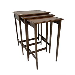 Edwardian mahogany wall hanging corner display cabinet, projecting dentil cornice over astragal glazed door (W56cm, H93cm), and an Edwardian mahogany nest of three tables (46cm x 36cm, H60cm)