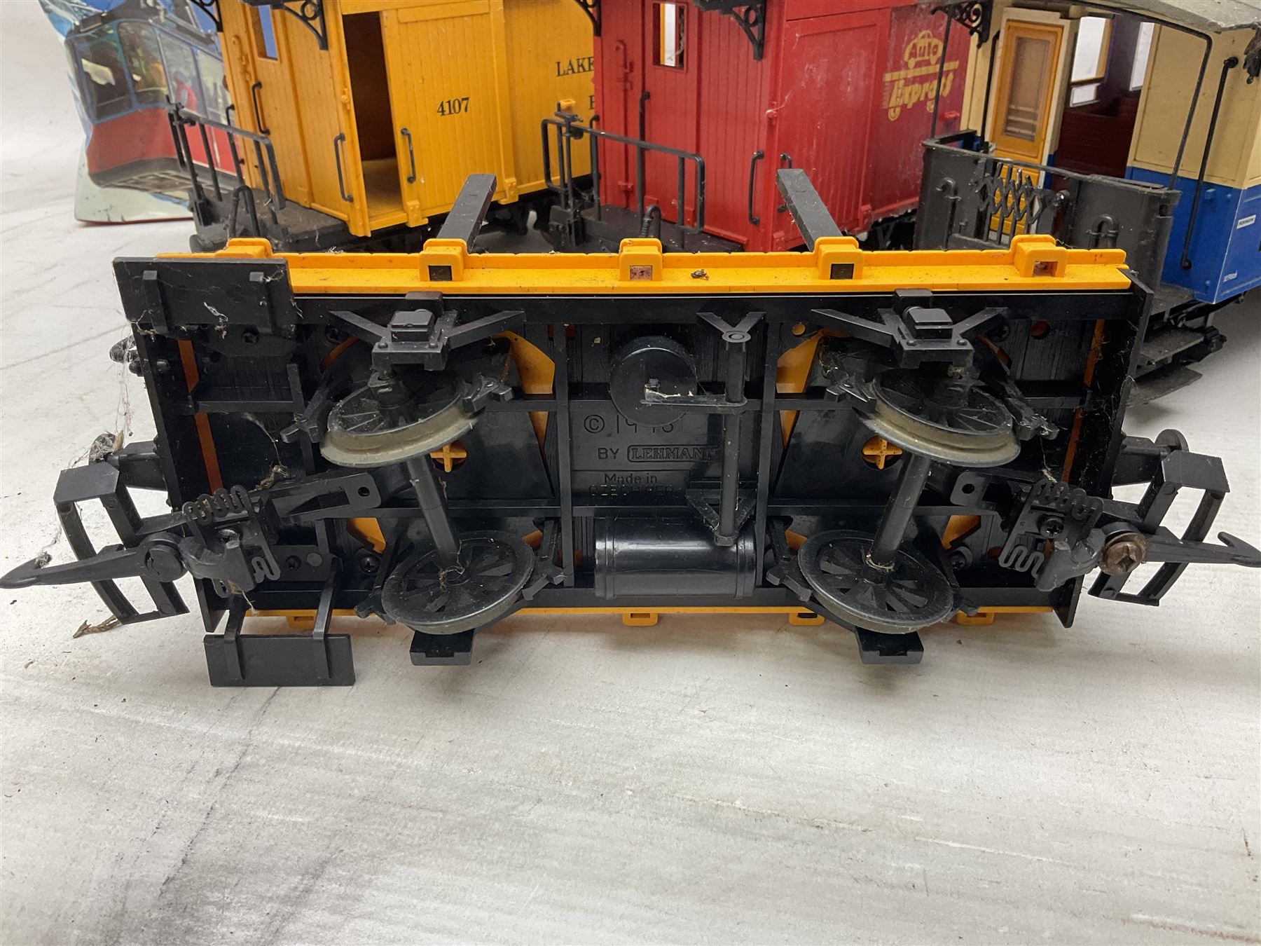 Three LGB (Lehmann Gross Bahn) G scale, gauge 1, rolling stock wagons, comprising two Lake George and Boulder wagons and an Auto Express wagon, together with a LGB passenger coach, other LGB rolling stock and a Lehmann Rigi900 ski lift