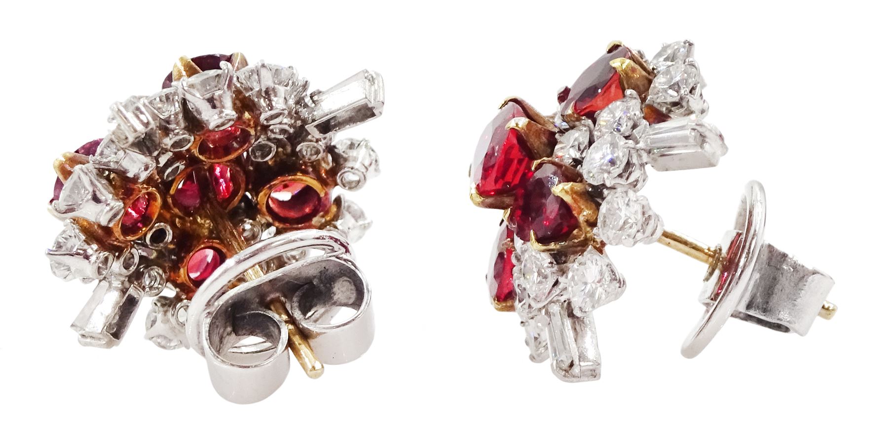 Pair of 18ct white and yellow gold Burmese ruby and diamond stud earrings, each cluster with five oval and round cut rubies and round brilliant cut and tapered baguette cut diamonds, total ruby weight approx 3.40 carat, total diamond weight approx 2.25 carat, in fitted box by Licht & Morrison, London