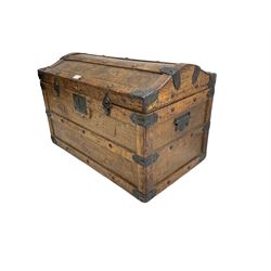 Late 19th to early 20th century oak framed travelling trunk, dome top with iron fittings and panelled sides and top, interior labelled 'The Anchor Patent Waterproof Travelling Trunk - 1902'