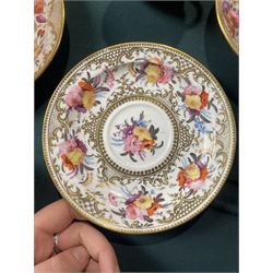 Coalport tea and coffee cups, pattern no. 830, decorated with sprays of flowers within gilt borders, comprising three teacups, four coffee cups and five saucers, with another matched teacup and saucer 