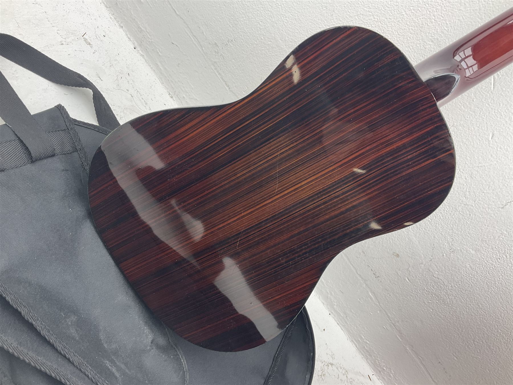 Saxon acoustic guitar Folk Model 812, serial no.43263 L102cm; Jose Ferrer El Primo small or child's size acoustic guitar, serial no.006980 L85cm; both in carrying soft cases; and Spanish Admira Concert Grande acoustic guitar (3)