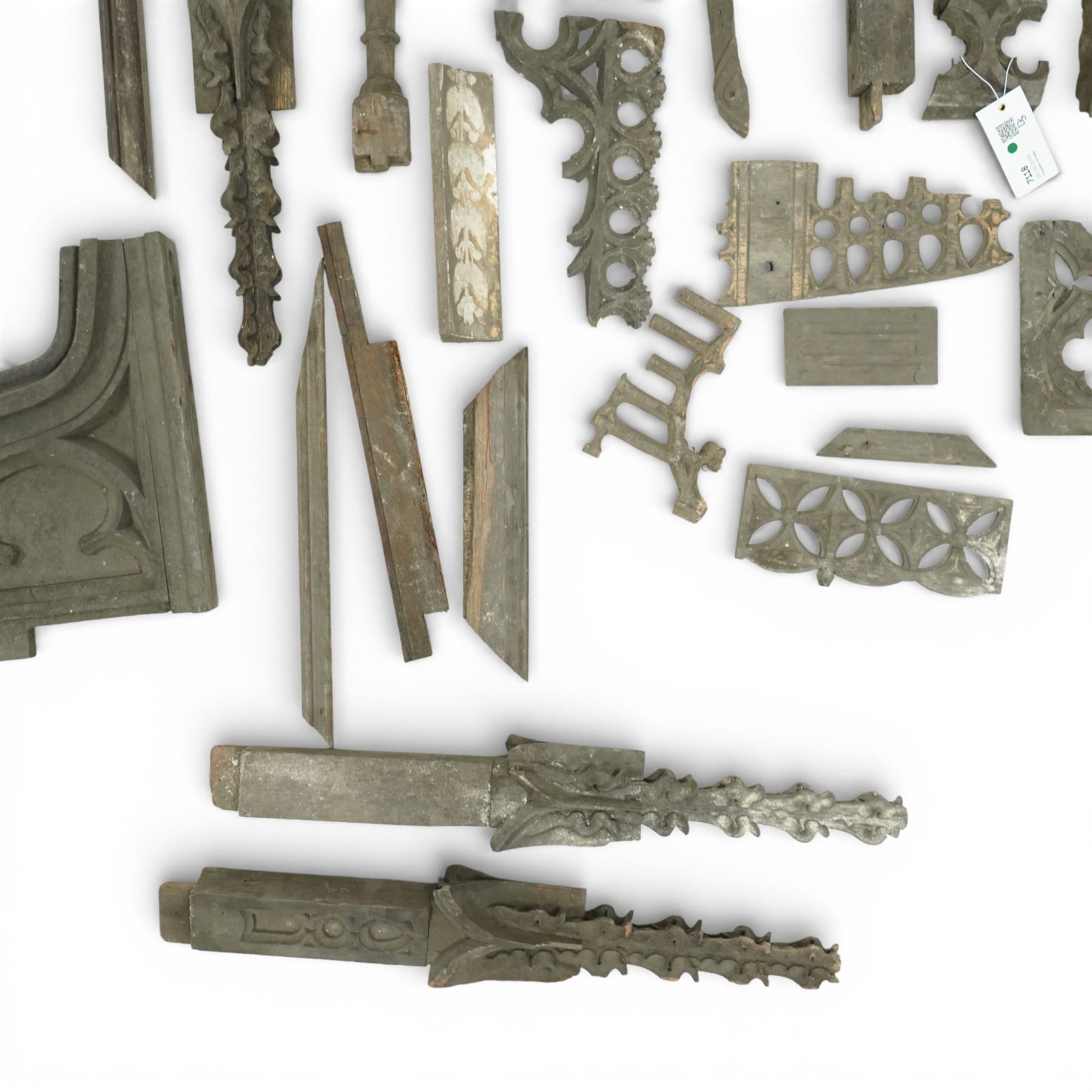 Architectural Salvage - Collection of oak ecclesiastical carvings, 19th century, comprising various finials, including four crocketed examples, some with fruit and foliate carved motifs, corbel, and others
Notes: Removed in the 19th century from the church in the grounds of a private Yorkshire estate 
Provenance: property of a Nobleman