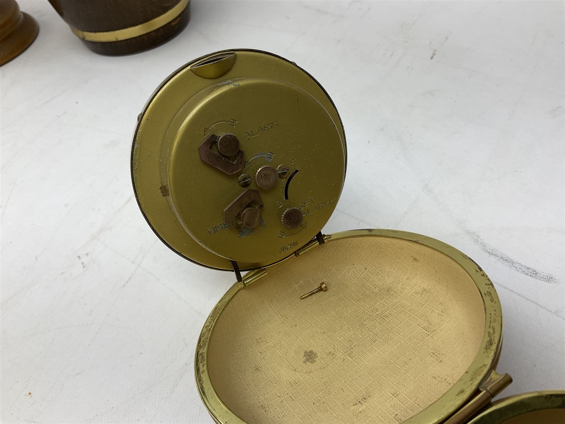 Silver 1969 Cunard RMS Queen Elizabeth maiden voyage commemorative medallion, in original Slade, Hampton & Son case with certificate, two Stratton R.M.S Queen Elizabeth mirror compacts, Stratton R.M.S Queen Mary compact, mid 20th century P&O Canberra Round World Voyage miniature globe, S.S Oriana ash tray modelled as a barrel, Norah Wellings sailor doll, and other maritime and shipping memorabilia 