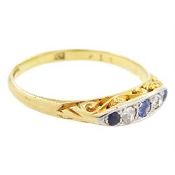 Early 20th century 18ct gold sapphire and diamond five stone ring, set with three round cut sapphires and two old cut diamonds and scroll engraved gallery 