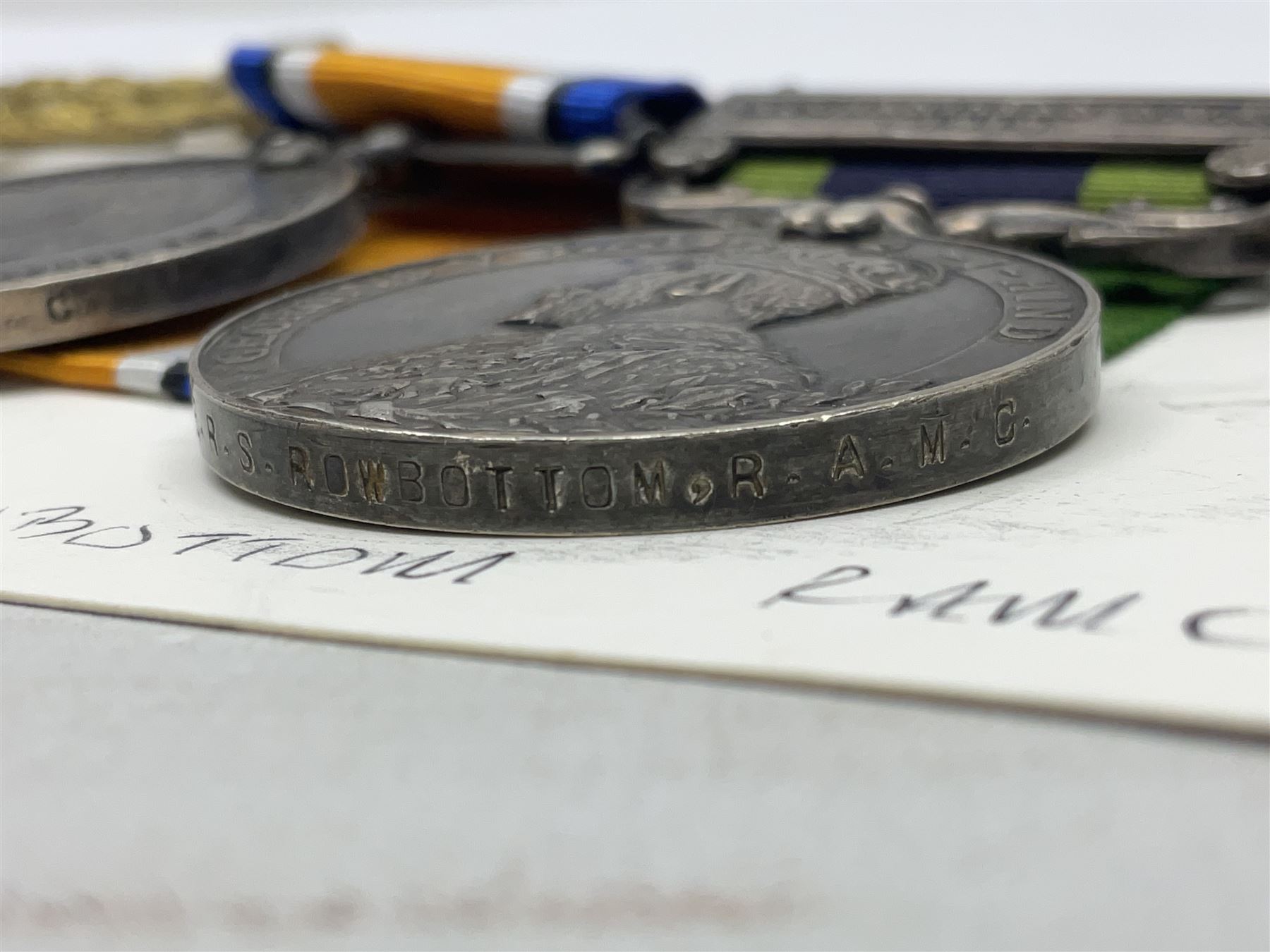 George V India General Service Medal with Afghanistan N.W.F. 1919 clasp and WW1 British War Medal awarded to 79561 Pte. R.D. Rowbottom R.A.M.C.; both with ribbons; card mounted with cap badge and Medical Corps cloth badge