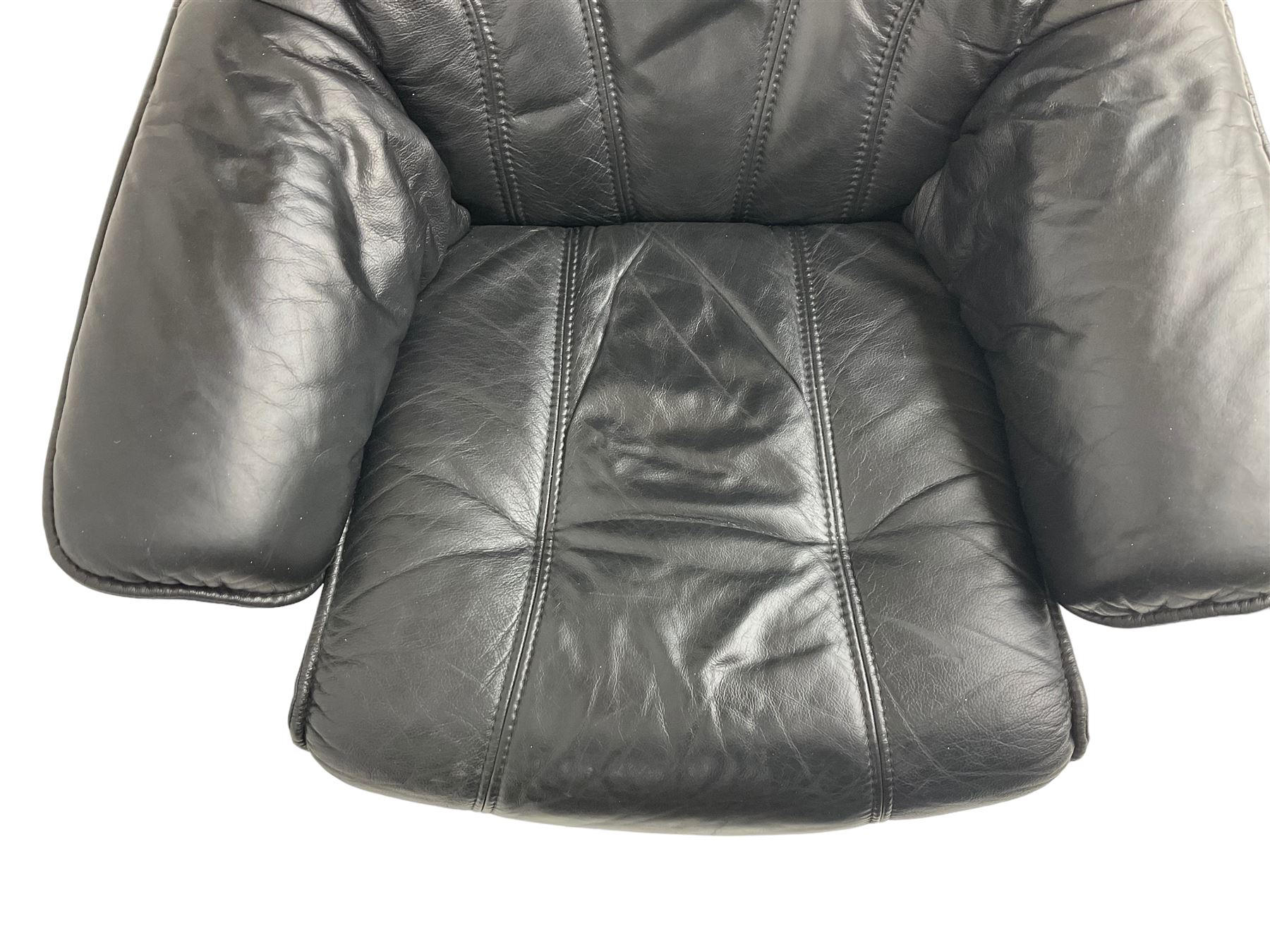 Anderssons of Sweden - mid-20th century design swivel armchair, upholstered black leather, raised on beech U-frame supports with circular base, together with matching footstool 