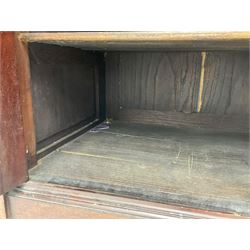 The Shannon Limited - late Victorian walnut filing cabinet, fitted with twenty-four small filing drawers, each with brass handle with label holder, fluted uprights, double cupboard below enclosed by two panelled doors, on turned feet, with brass plaque inscribed 'The Shannon, Limited, Ropemaker St. London, E.C.'