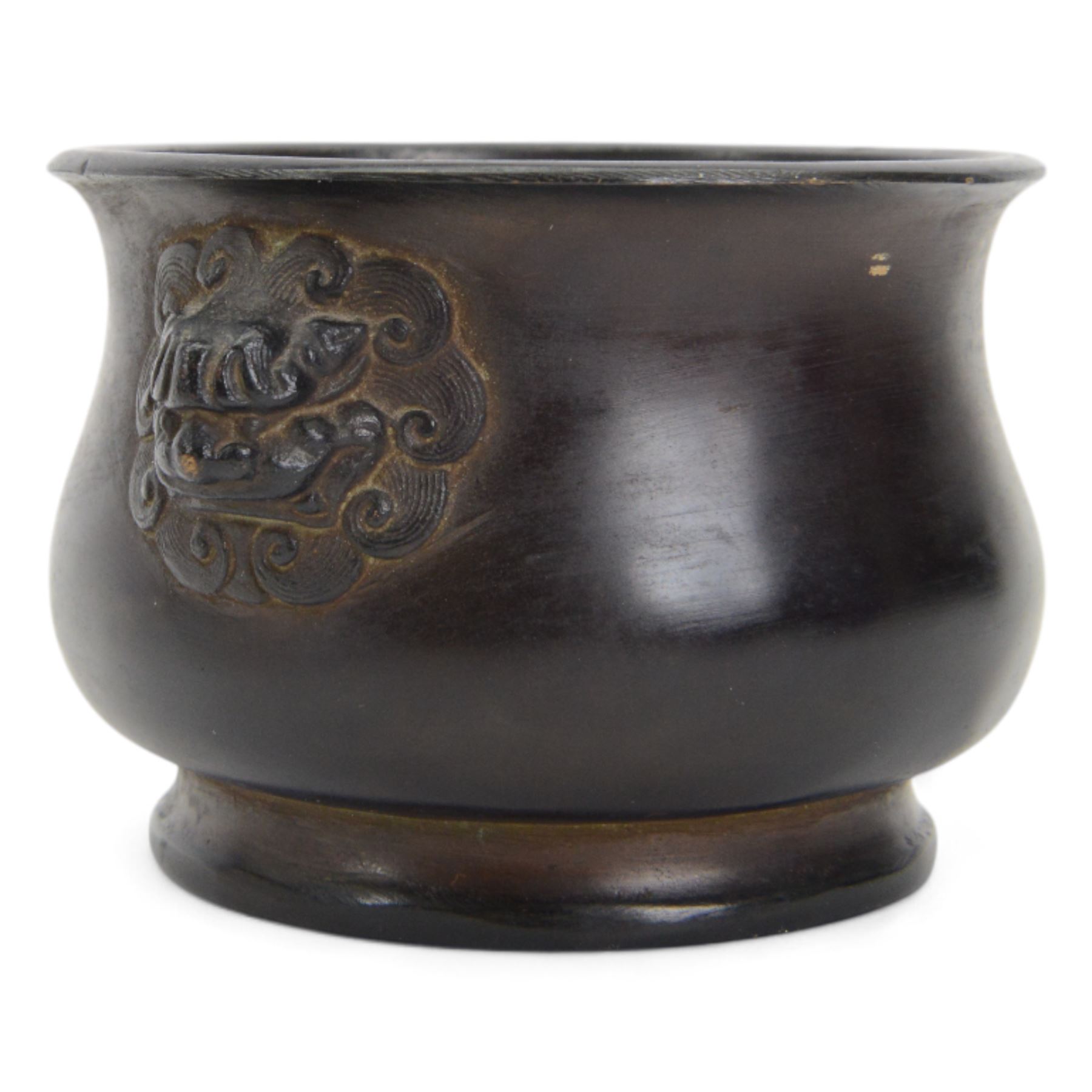 Chinese bronze censer, of circular bellied form with temple lion mask handles, upon a circular foot, with apocryphal six character Xuande mark within a border of two dragons chasing a pearl, H7.5cm D10/5cm
