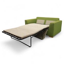 Contemporary lime green upholstered sofa bed, with rectangular arms and two seat cushions, the back with two stitched backrest cushions, on low block feet