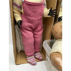 Quantity of vintage and later dolls to include unusual three faced example and further dolls marked C.J, Gloobee, Rosebud etc in three boxes