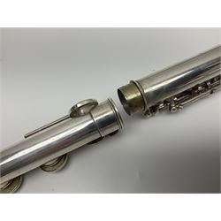 Boosey & Hawkes London Regent three-piece flute, serial no.345447; in B&H Bandhite hard carrying case; and Deg Music Company Inc. USA Claudel Model three-piece flute, serial no.491718, in hard carrying case (2)